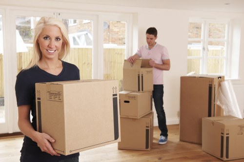 Apartment moving in Surbiton with packed boxes and careful handling