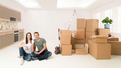 Organised office relocation boxes and workspace setup in Surbiton