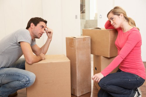 Surbiton packing team organizing boxes and fragile items carefully